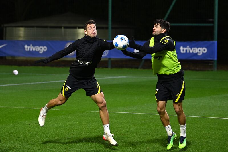 César Azpilicueta and Christian Pulisic compete for the ball.