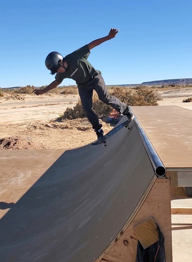 A skateboarder tries out a new ramp in the Village of Tewa on the Hopi reservation in north-eastern Arizona. AP
