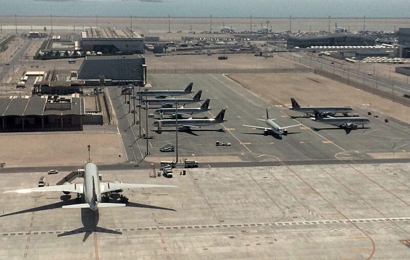 Parked Qatar Airways planes in Hamad International Airport in Doha, Qatar on June 6, 2017 after the UAE, Saudi Arabia, Bahrain and Egypt cut diplomatic ties with Doha, banning Qatar from landing in their airports. Hadi Mizban/AP Photo