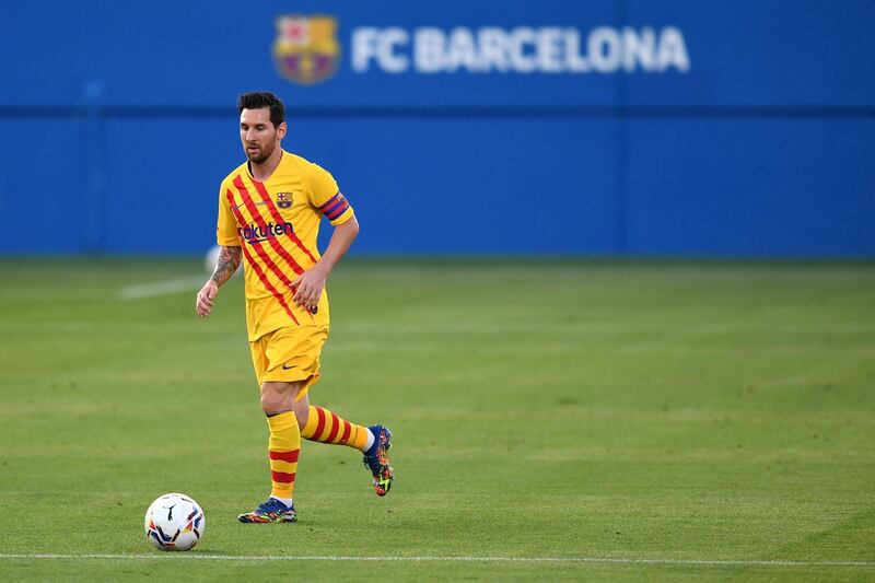 Lionel Messi runs with the ball the during the pre-season friendly match between Barcelona and Gimnastic at Johan Cruyff Stadium. Getty Images