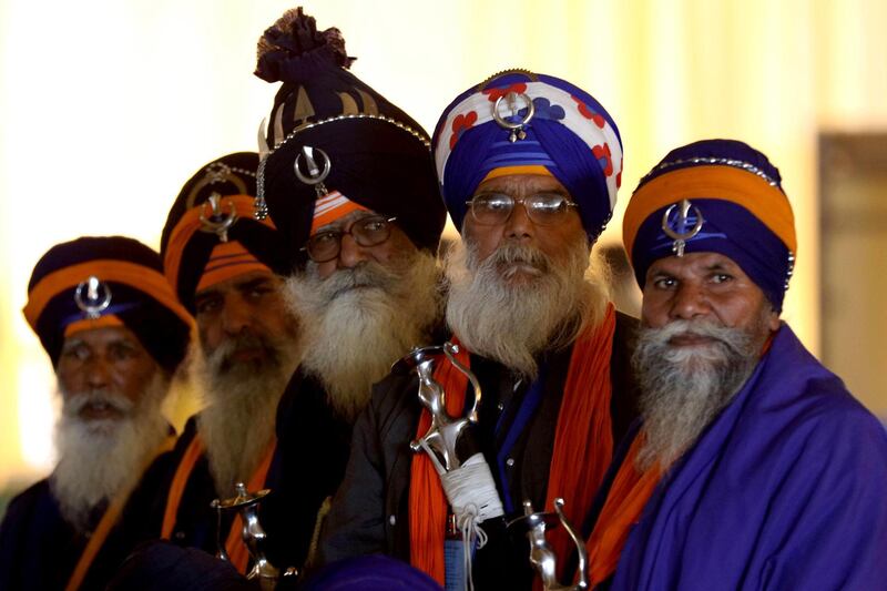 epaselect epa07195037 Sikh pilgrims attend a groundbreaking ceremony Kartarpur Corridor to be set up between India and Pakistan in Kartarpur, Pakistan, 28 November 2018. Pakistan's Prime Minister Imran Khan attended the groundbreaking ceremony for the first visa-free border crossing with India, a corridor that will allow Sikh pilgrims to easily visit their shrines on each side of the border. The crossing, known as the Kartarpur corridor is a rare sign of cooperation between the two nuclear-armed rival countries.  EPA/RAHAT DAR