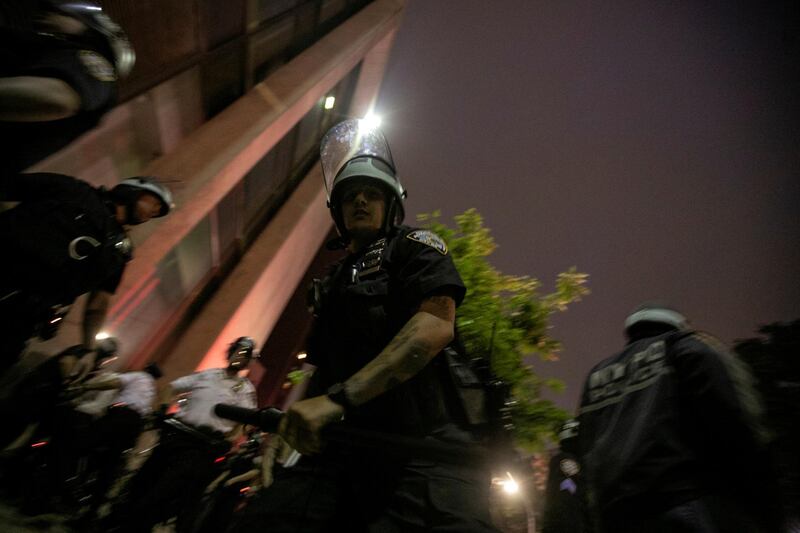 A NYPD policeman is seen during a protest in Brooklyn, New York City. Reuters
