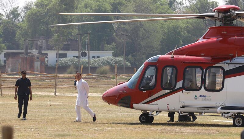 Indian National Congress party president Rahul Gandhi arrive for nomination during a roadshow before filing his nomination for the upcoming general election at the district collector's office in Amethi on April 10, 2019.
PHOTO : JITENDRA PRAKASH