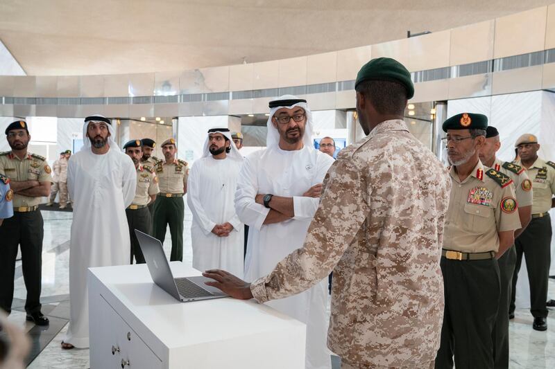 ABU DHABI, UNITED ARAB EMIRATES - April 28, 2019: HH Sheikh Mohamed bin Zayed Al Nahyan, Crown Prince of Abu Dhabi and Deputy Supreme Commander of the UAE Armed Forces (C), attends e-skills exhibition for national service recruits, at Armed Forces Officers Club. Seen with HE Lt General Hamad Thani Al Romaithi, Chief of Staff UAE Armed Forces (R) and HE Mohamed Mubarak Al Mazrouei, Undersecretary of the Crown Prince Court of Abu Dhabi (2nd L).
( Mohamed Al Hammadi / Ministry of Presidential Affairs )
---