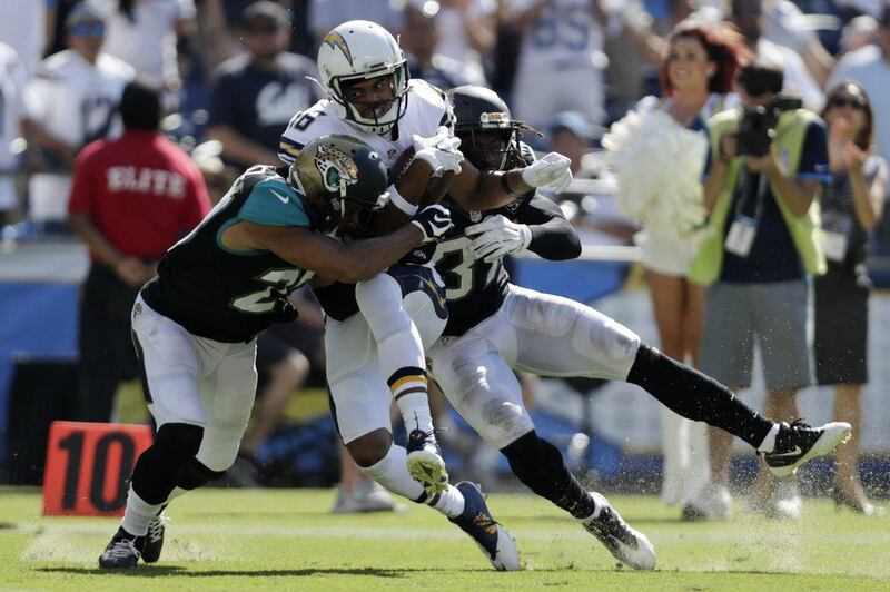San Diego Chargers 38 Jacksonville Jaguars 14: Chargers wide receiver Tyrell Williams is hit on his way to scoring a touchdown. Ryan Kang / AP Photo