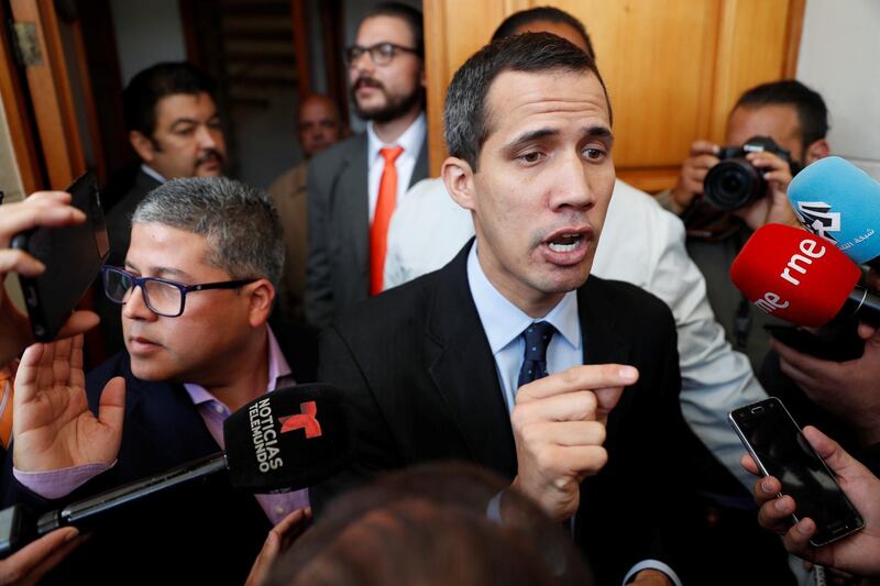 Venezuelan opposition leader and self-proclaimed interim president Juan Guaido talks to the media before a session of the Venezuela’s National Assembly in Caracas, Venezuela January 29, 2019. REUTERS/Carlos Garcia Rawlins