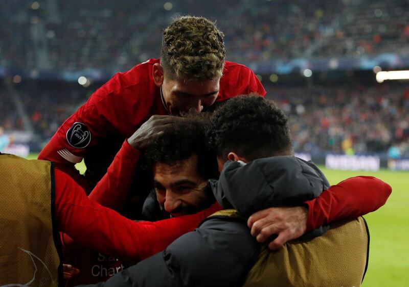Soccer Football - Champions League - Group E - FC Salzburg v Liverpool - Red Bull Arena Salzburg, Salzburg, Austria - December 10, 2019  Liverpool's Mohamed Salah celebrates scoring their second goal with Roberto Firmino and teammates   Action Images via Reuters/John Sibley