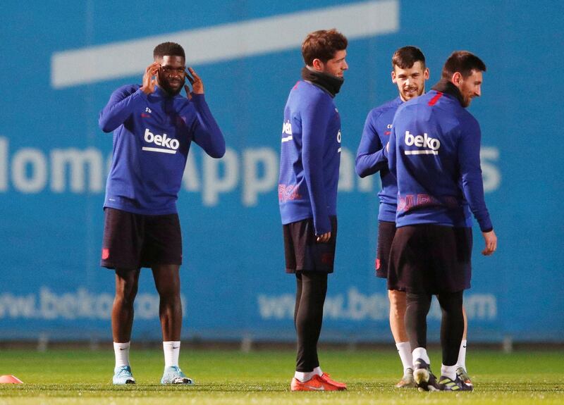 Barcelona's Samuel Umtiti, left, and teammates during trainingn. Reuters