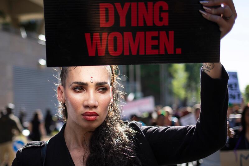 epa07839552 Some of the thousands of mostly women demonstrate against the countries extraordinarily high rate of gender violence against women at the JSE (Johannesburg Stock Exchange), Johannesburg, South Africa, 13 September 2019. The protest action was organised by 72 organisations who say they have had enough of the rates of rape and other sexually motivated offenses and murder. A total of 36,597 sexual offences against women were reported during 2018 with many never being reported.  EPA/KIM LUDBROOK