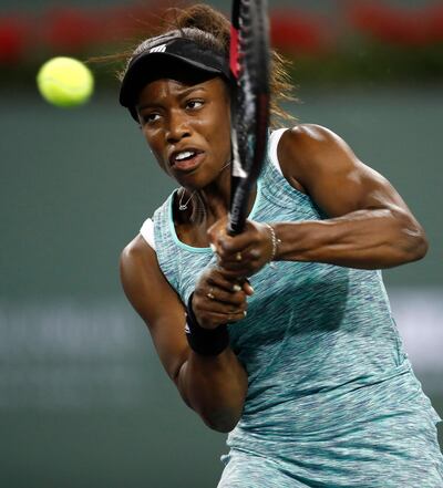epa06592718 Sachia Vickery of USA in action against Garbine Muguruza of Spain during the BNP Paribas Open at the Indian Wells  Tennis Garden in Indian Wells, California, USA, 09 March 2018.  EPA/JOHN G. MABANGLO
