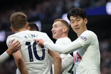 LONDON, ENGLAND - MARCH 20: Heung-Min Son of Tottenham Hotspur celebrates with teammate Harry Kane after scoring their side's second goal during the Premier League match between Tottenham Hotspur and West Ham United at Tottenham Hotspur Stadium on March 20, 2022 in London, England. (Photo by Eddie Keogh / Getty Images)