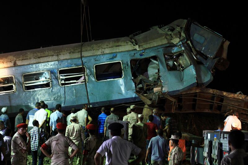 People view the wreckage after two passenger trains collided in Alexandria. Hazem Gouda / EPA