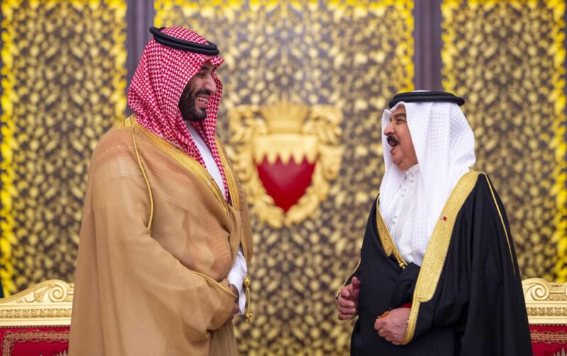 King Hamad of Bahrain, right, welcomes Saudi Crown Prince Mohammed bin Salman at Sakhir Palace, in Bahrain's capital Manama. AFP