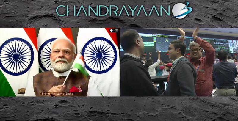 Mr Modi watches as the lander touches down safely. Photo: Isro
