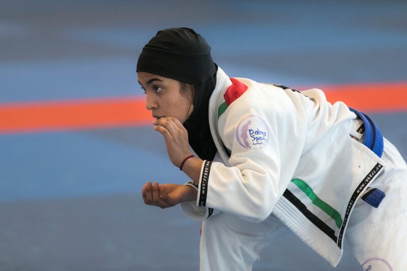 ABU DHABI, UNITED ARAB EMIRATES - AUGUST 14, 2018. 

Wadima Al Yafei, in white, of the UAE Jiu Jitsu national team, trains for the Asian Games 2018.

(Photo by Reem Mohammed/The National)

Reporter: AMITH PASSATH
Section:  SP