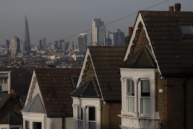 A terrace of residential houses in the Dulwich district overlooking skyscrapers in the City of London. In February alone, house prices rose 0.7 per cent reversing a 0.2 per cent decline in January. Bloomberg