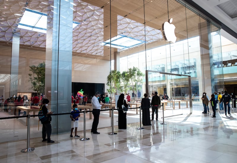 Customers queue up early at an Apple Store opening at Yas Mall. Victor Besa / The National.