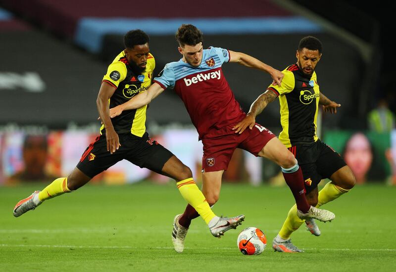 Watford's Ismaila Sarr in action with West Ham United's Declan Rice.  Reuters