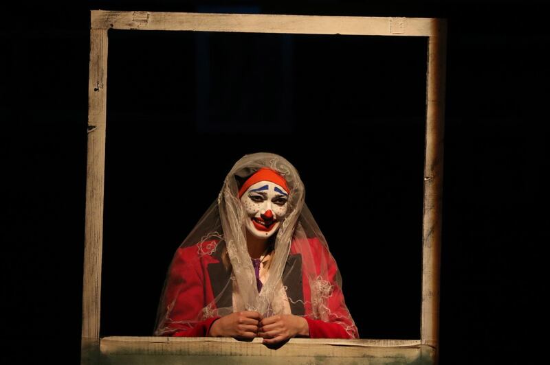 epa07717630 Syrian actress Lama Baddor performs during the theatrical show 'three stories' at al-Hamra Theater in Damascus, Syria, 14 July 2019. The show is directed by Ayman Zaidan in cooperation with author Mahmoud Jaafouri for a story entitled 'Stories to be told' by Argentine writer and theater director Oswaldo Dracon. The show tells about real stories from the Syrian society during the years of war.  EPA/YOUSSEF BADAWI