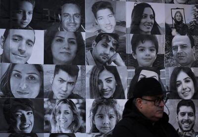 Pictures of some of the victims of flight PS752 on display in Vancouver, British Columbia. AP
