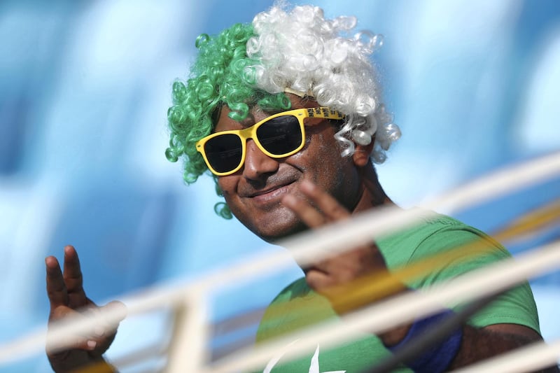 Dubai, United Arab Emirates - September 16, 2018: A Pakistan fan in the game between Pakistan and Hong Kong in the Asia cup. Sunday, September 16th, 2018 at Sports City, Dubai. Chris Whiteoak / The National