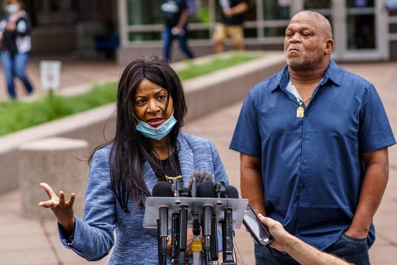 George Floyd’s uncle Selwyn Jones (R) and his aunt Angela Harrelson (L) speak to the media during a pre-trial hearing for the former officers charged in the death of Mr Floyd. AFP
