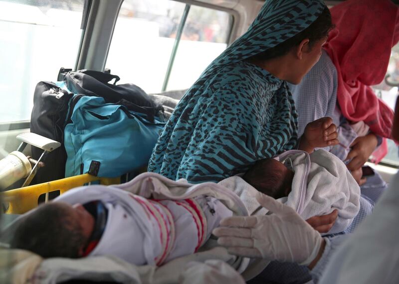 Babies are taken away by ambulance after gunmen attacked a maternity hospital, in Kabul, Afghanistan. AP Photo