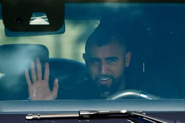 Barcelona's Chilean midfielder Arturo Vidal waves as he arrives at Barcelona's Ciutat Esportiva Joan Gamper in Sant Joan Despi to undergo a medical test for COVID-19, on August 30, 2020. The first indication of how determined Lionel Messi is to leave Barcelona and how ugly this dispute could become will be gauged at the club's training ground today. Barca's greatest ever player is due at the Ciutat Esportiva today morning for coronavirus tests, which must be taken and passed if he is to join Ronald Koeman's first pre-season session tomorrow. / AFP / Pau BARRENA