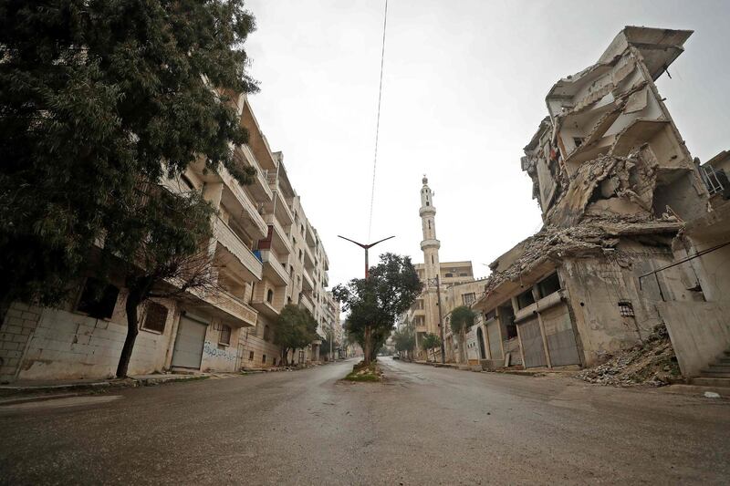 A damaged building in the rebel-held town of Ariha in the northern countryside of Syria's Idlib province following an air strike by pro-regime forces.  AFP