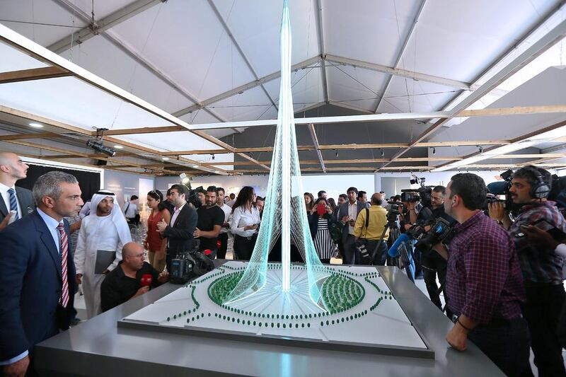 Visitors take a look at a scale model of the observation tower planned for Dubai. Pawan Singh / The National