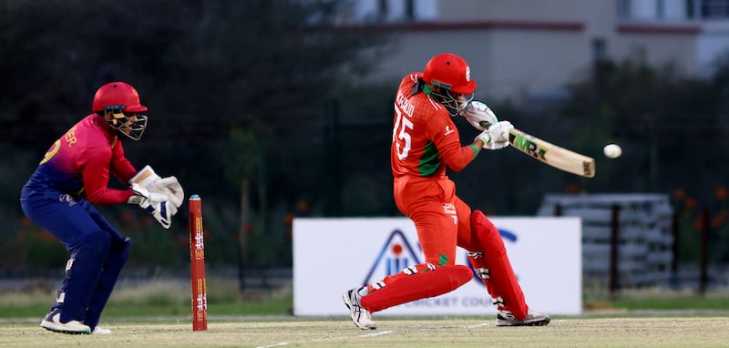 Khalid Kail of Oman blasts the ball. He made 50 off 23 deliveries.