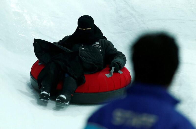 A visitor enjoys a ride at Snow City, which opened in mid July at Al Othaim Mall in Riyadh. Faisal Al Nasser / Reuters / July 26, 2016
