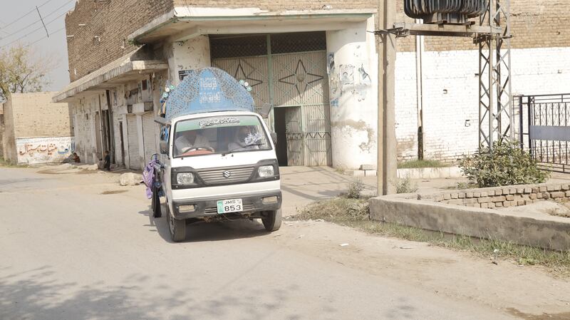 Arab Shah uses a Suzuki van to another village to safely drop off schoolgirls at their homes