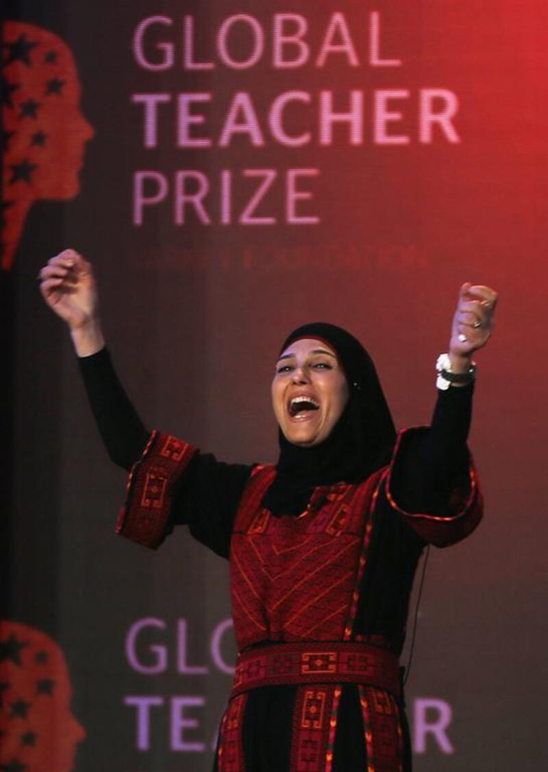 Hanan Al Hroub, the Palestinian schoolteacher, is elated after she won the US$1 million Global Teacher Prize in Dubai on Sunday. Kamran Jebreili / AP Photo