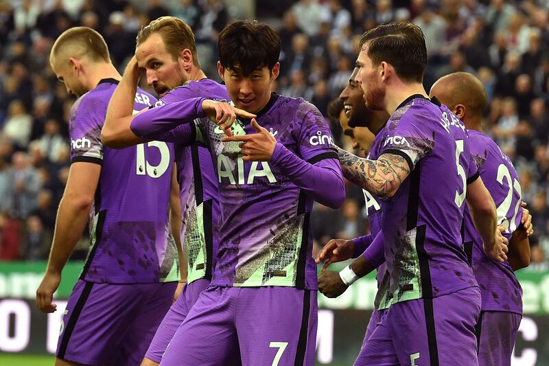 Tottenham Hotspur's South Korean striker Son Heung-Min (C) celebrates with teammates after scoring their third goal during the English Premier League football match between Newcastle United and Tottenham Hotspur at St James' Park in Newcastle-upon-Tyne, north east England on October 17, 2021.  (Photo by Paul ELLIS / AFP) / RESTRICTED TO EDITORIAL USE.  No use with unauthorized audio, video, data, fixture lists, club/league logos or 'live' services.  Online in-match use limited to 120 images.  An additional 40 images may be used in extra time.  No video emulation.  Social media in-match use limited to 120 images.  An additional 40 images may be used in extra time.  No use in betting publications, games or single club/league/player publications.   /  