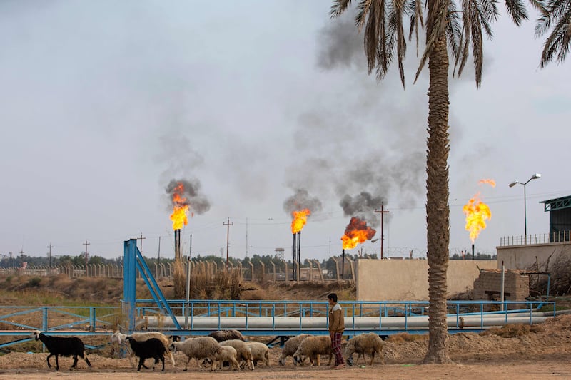 The Nahr bin Omar oil field and facility near Basra.  The flares produce vast amounts of carbon dioxide and other greenhouse gases, contributing to global warming without any economic or social benefit.