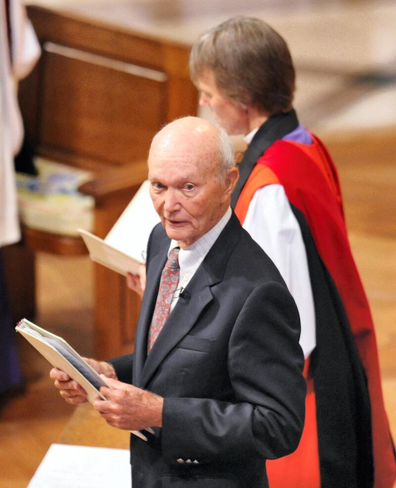 Astronaut Michael Collins reads a prayer during a memorial for astronaut Neil Armstrong September 13, 2012 at the National Cathedral in Washington, DC. Armstrong, the first man to set foot on the moon, died August 25 at the age of 82. AFP PHOTO/Mandel NGAN (Photo by MANDEL NGAN / AFP)