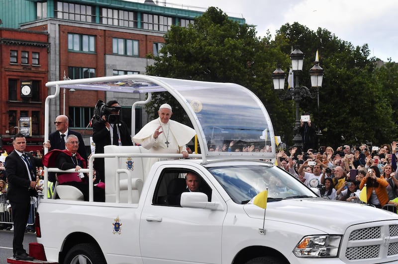DUBLIN, IRELAND - AUGUST 25:  Pope Francis greets the public as he travels through the city in the Popemobile on August 25, 2018 in Dublin, Ireland. Pope Francis is the 266th Catholic Pope and current sovereign of the Vatican. His visit, the first by a Pope since John Paul II's in 1979, is expected to attract hundreds of thousands of Catholics to a series of events in Dublin and Knock. During his visit he will have private meetings with victims of sexual abuse by Catholic clergy.  (Photo by Charles McQuillan/Getty Images)