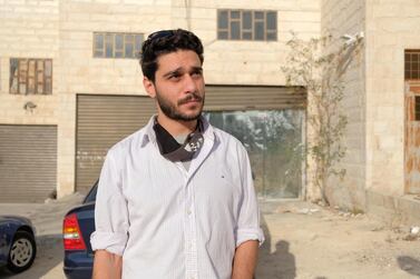 Abdelrahman Kilani stands outside his workshop in Ruseifeh, on the outskirts of Amman. Amy McConaghy / The National