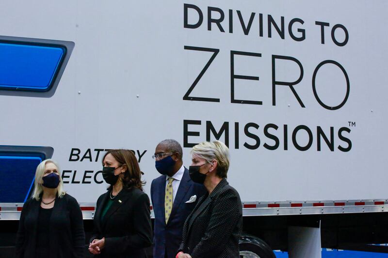 US Vice President Kamala Harris stands next to an electric lorry in New York. Ms Harris announced $127 million in new federal funding for medium and heavy-duty lorries that produce zero carbon emissions. AFP