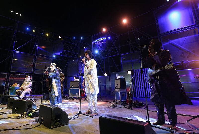 Tinariwen perform on the opening day of Warehouse421 in Abu Dhabi on Thursday. Satish Kumar / The National 