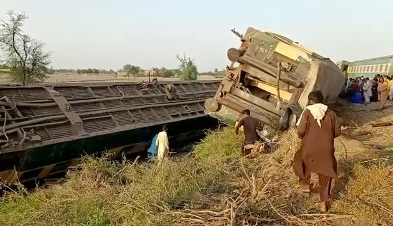 This video grab shows the aftermath of a crash involving two trains in Ghotki, Pakistan. AP Photo