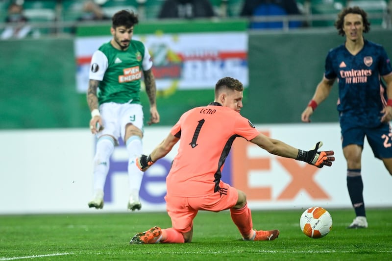 Taxiarchis Fountas finishes past Arsenal goalkeeper Bernd Leno to give Rapid Vienna the lead. EPA