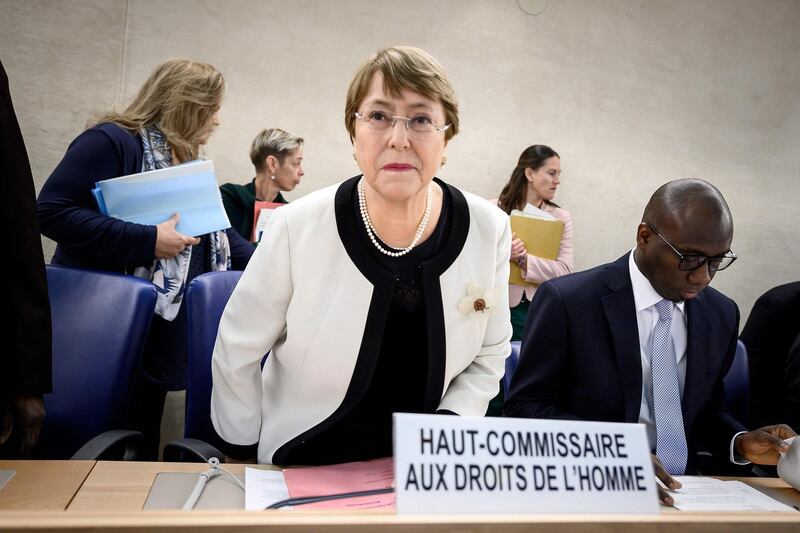 United Nations High Commissioner for Human Rights Michelle Bachelet takes her place to present her annual report before the UN Human right council members on March 6, 2019 in Geneva. / AFP / Fabrice COFFRINI
