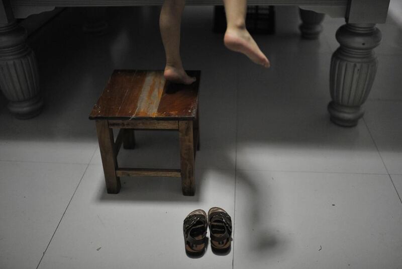 Wuka trains on a custom-built table from where he can play. Reuters