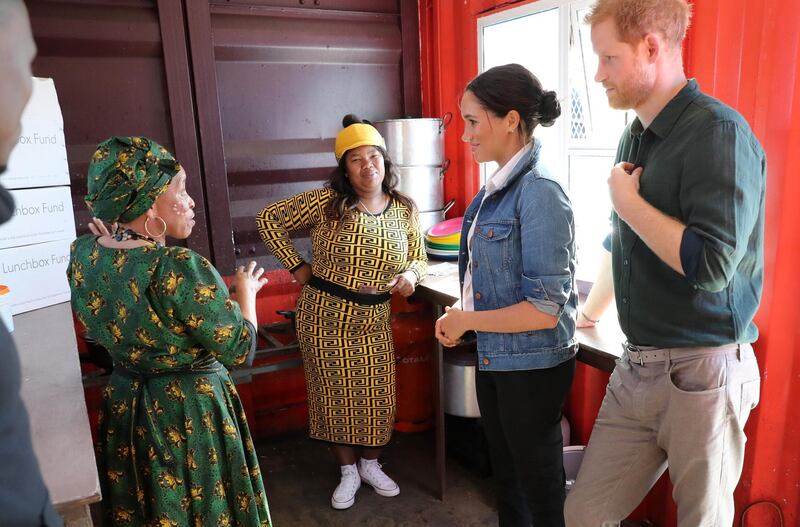 Meghan, Duchess of Sussex and Prince Harry, Duke of Sussex visit the Waves for Change compound kitchen, where charity The Lunchbox Fund, provides nearly 30,000 nutritious meals every day to programmes in townships and rural areas at Monwabisi Beach in Cape Town, South Africa. Waves for Change supports local surf mentors to provide mental health services to vulnerable young people living in under resourced communities. Getty Images