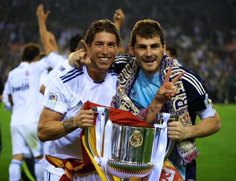 VALENCIA, BARCELONA - APRIL 20:  Iker Casillas (R) and Sergio Ramos of Real Madrid celebrate after the Copa del Rey final match between Real Madrid and Barcelona at Estadio Mestalla on April 20, 2011 in Valencia, Spain.  (Photo by Manuel Queimadelos Alonso/Getty Images)