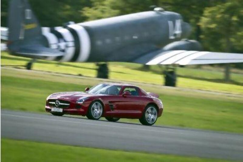 David Coulthard laps the Dunsfold Aerodrome in a Mercedes-Benz SLS AMG