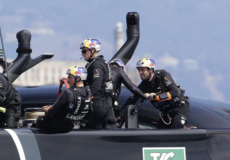 Ben Ainslie, right, has big America's Cup ambitions. Eric Risberg / AP Photo