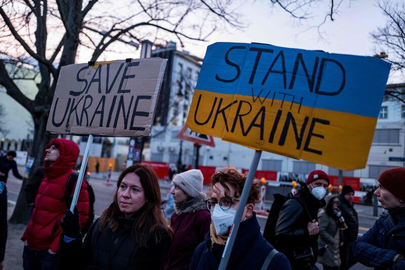 Protesters express support for Ukraine in front of Russia's embassy in Berlin, Germany. AFP
